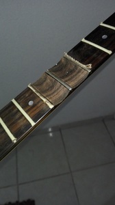 scalloping a guitar fretboard